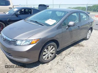 2012 Honda Civic LX z VIN 19XFB2F52CE076933, wystawiony jako IAAI lot #42149375 z przebiegiem 155 496 mil mil oraz . Historia ofert i sprzedaży dostępna na DreamBid. Obrazek 17.