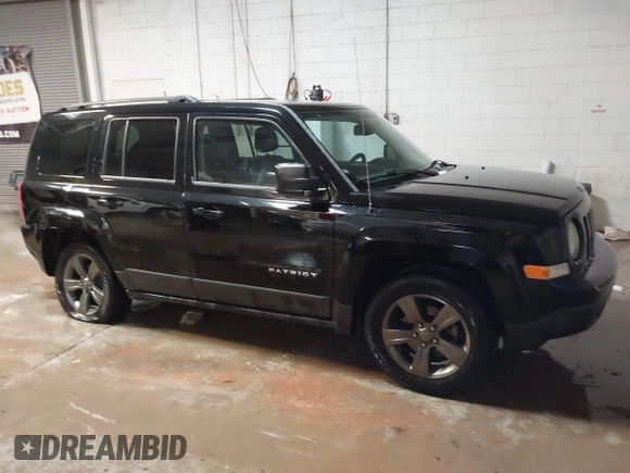 2014 Jeep Patriot High Altitude with VIN 1C4NJPFAXED679271, listed as a IAAI auction lot 41290600 with 157,256 mi miles and . Bid and sale history available at carsss.com. Image 13.