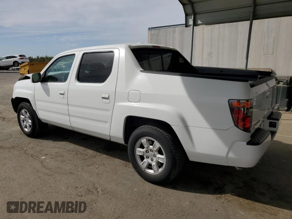 2006 Honda Ridgeline RTL with VIN 2HJYK16506H570523, listed as a Copart auction lot 75746474 with 142,694 mi miles and Salvage Title. Bid and sale history available at carsss.com. Image 2.
