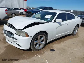 2014 Dodge Charger SE with VIN 2C3CDXBG7EH130112, listed as a IAAI auction lot 41670160 with 216,373 mi miles. Bid and sale history available at carsss.com. Image 17.
