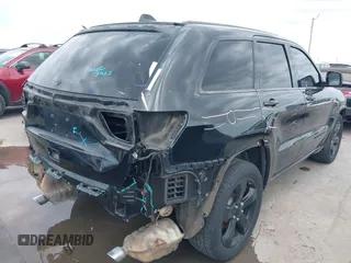 2015 Jeep Grand Cherokee Altitude z VIN 1C4RJFAGXFC659990, wystawiony jako IAAI lot #42331922 z przebiegiem 121 379 mil mil oraz . Historia ofert i sprzedaży dostępna na DreamBid. Obrazek 4.