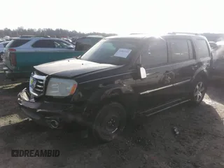 2012 Honda Pilot Touring with VIN 5FNYF3H90CB035309, listed as a IAAI auction lot 41063215 with 228,081 mi miles and . Bid and sale history available at carsss.com. Image 19.