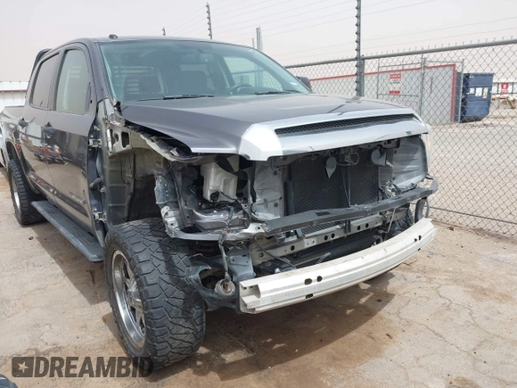 2014 Toyota Tundra SR5 z VIN 5TFEM5F1XEX082020, wystawiony jako IAAI lot #41914391 z przebiegiem 75 787 mil mil oraz . Historia ofert i sprzedaży dostępna na DreamBid. Obrazek 6.