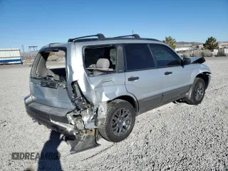 2003 Subaru Forester XS with VIN JF1SG65603G741030, listed as a Copart auction lot 46109315 with 154,469 mi miles and Salvage title. Bid and sale history available at DreamBid. Image 3.