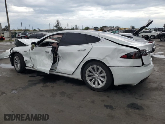 2016 Tesla Model S 70 with VIN 5YJSA1E10GF153812, listed as a Copart auction lot 52108565 with 90,938 mi miles and Non Repairable. Bid and sale history available at DreamBid. Image 2.