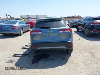 2023 Toyota Corolla Cross LE with VIN 7MUCAAAGXPV045651, listed as a IAAI auction lot 42006289 with 23,282 mi miles and . Bid and sale history available at DreamBid. Image 16.