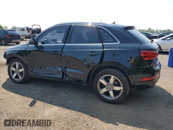 2015 Audi Q3 with VIN WA1EFEFS7FR002823, listed as a Copart auction lot 62159355 with 163,640 mi miles and Salvage title. Bid and sale history available at DreamBid. Image 2.