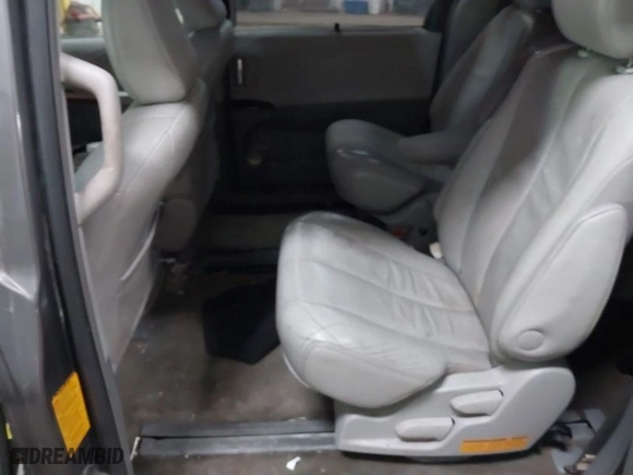 2012 Toyota Sienna XLE AAS with VIN 5TDYK3DC9CS268758, listed as a IAAI auction lot 41613513 with 214,601 mi miles. Bid and sale history available at carsss.com. Image 8.