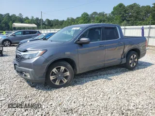 2017 Honda Ridgeline RTL-T with VIN 5FPYK2F69HB010616, listed as a Copart auction lot 58718625 with 113,047 mi miles and Salvage title. Bid and sale history available at DreamBid. Image 1.