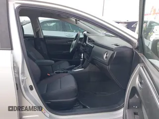 2018 Toyota Corolla L z VIN 5YFBURHE2JP831394, wystawiony jako IAAI lot #41689172 z przebiegiem 74 985 mil mil oraz . Historia ofert i sprzedaży dostępna na DreamBid. Obrazek 5.