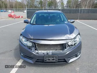 2016 Honda Civic Sedan EX-L with VIN 19XFC1F73GE201419, listed as a IAAI auction lot 42027720 with 168,134 mi miles. Bid and sale history available at carsss.com. Image 12.