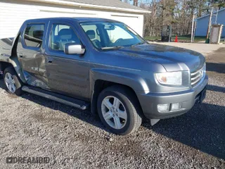 2013 Honda Ridgeline RTL with VIN 5FPYK1F55DB004842, listed as a IAAI auction lot 41843327 with 178,997 mi miles. Bid and sale history available at carsss.com. Image 1.