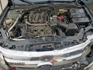 2012 Ford Fusion SEL z VIN 3FAHP0JGXCR426220, wystawiony jako Copart lot #59346985 z przebiegiem 151 397 mil mil oraz Szkoda całkowita • Salvage title. Historia ofert i sprzedaży dostępna na DreamBid. Obrazek 11.