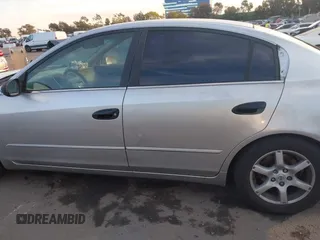 2002 Nissan Altima S with VIN 1N4AL11D72C174190, listed as a IAAI auction lot 41390812 with 171,646 mi miles. Bid and sale history available at carsss.com. Image 14.
