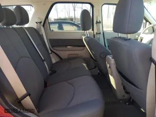 2010 Mazda Tribute Touring with VIN 4F2CY9C77AKM04941, listed as a Copart auction lot 50802955 with 118,480 mi miles and Salvage Title. Bid and sale history available at carsss.com. Image 11.