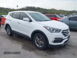 2018 Hyundai Santa Fe 2.4L z VIN 5XYZTDLB1JG551083, wystawiony jako IAAI lot #42012180 z przebiegiem 172 110 mil mil oraz . Historia ofert i sprzedaży dostępna na DreamBid. Obrazek 1.