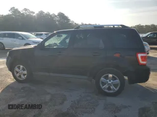 2011 Ford Escape Limited with VIN 1FMCU0EG5BKA72225, listed as a Copart auction lot 59972475 with 206,336 mi miles and Salvage title. Bid and sale history available at DreamBid. Image 2.