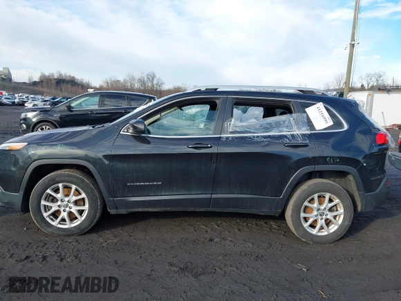 2016 Jeep Cherokee Latitude z VIN 1C4PJMCB6GW345413, wystawiony jako IAAI lot #41216995 z przebiegiem 254 311 mil mil oraz . Historia ofert i sprzedaży dostępna na DreamBid. Obrazek 14.