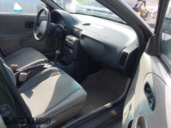 1999 Saturn SL z VIN 1G8ZH5280XZ249494, wystawiony jako IAAI lot #42347493 z przebiegiem 106 491 mil mil oraz . Historia ofert i sprzedaży dostępna na DreamBid. Obrazek 5.