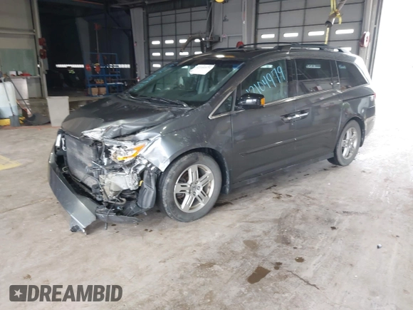 2011 Honda Odyssey Touring с VIN 5FNRL5H90BB025855, выставлен на аукционе IAAI как лот 42104979 с пробегом 165 010 миль миль и . История ставок и продаж доступна на DreamBid. Изображение 18.