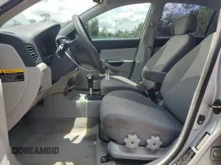 2006 Hyundai Accent GLS z VIN KMHCN46C46U060741, wystawiony jako Copart lot #59560575 z przebiegiem 93 966 mil mil oraz Szkoda całkowita • Salvage title. Historia ofert i sprzedaży dostępna na DreamBid. Obrazek 7.