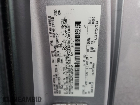 2013 Ford Escape Titanium with VIN 1FMCU9J94DUB00695, listed as a Copart auction lot 56633955 with 129,011 mi miles and Salvage title. Bid and sale history available at DreamBid. Image 13.