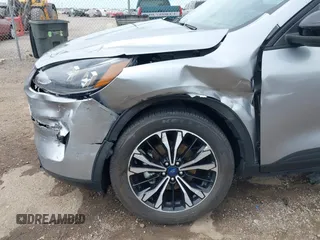 2021 Ford Escape SE Hybrid with VIN 1FMCU0BZ0MUB14085, listed as a IAAI auction lot 41942529 with 34,889 mi miles and . Bid and sale history available at DreamBid. Image 6.