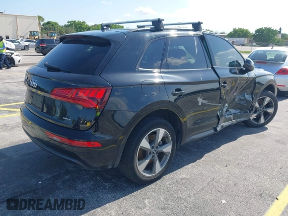 2020 Audi Q5 Premium with VIN WA1ANAFY2L2085872, listed as a IAAI auction lot 42354349 with 67,682 mi miles and . Bid and sale history available at DreamBid. Image 4.