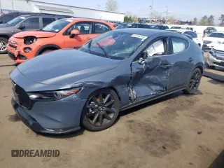 2021 Mazda Mazda3 Hatchback 2.5 Turbo Premium Plus with VIN JM1BPBNY7M1311309, listed as a Copart auction lot 54044315 with 59,642 mi miles and Salvage Title. Bid and sale history available at carsss.com. Image 1.