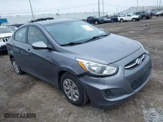 2015 Hyundai Accent GLS with VIN KMHCT4AE0FU929088, listed as a IAAI auction lot 41993359 with 149,958 mi miles. Bid and sale history available at carsss.com. Image 1.