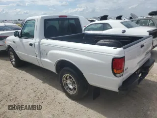 1999 Mazda B-Series 2WD Truck SX with VIN 4F4YR12C9XTM33421, listed as a Copart auction lot 77606664 with 13,748 mi miles and Non Repairable. Bid and sale history available at carsss.com. Image 2.