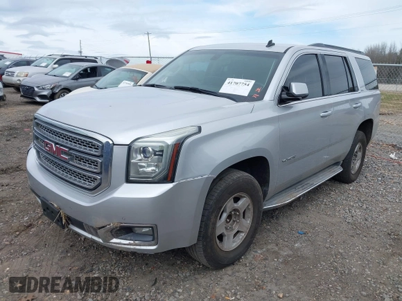 2015 GMC Yukon SLE with VIN 1GKS1AKC8FR201818, listed as a IAAI auction lot 41707754 with 193,100 mi miles. Bid and sale history available at carsss.com. Image 18.