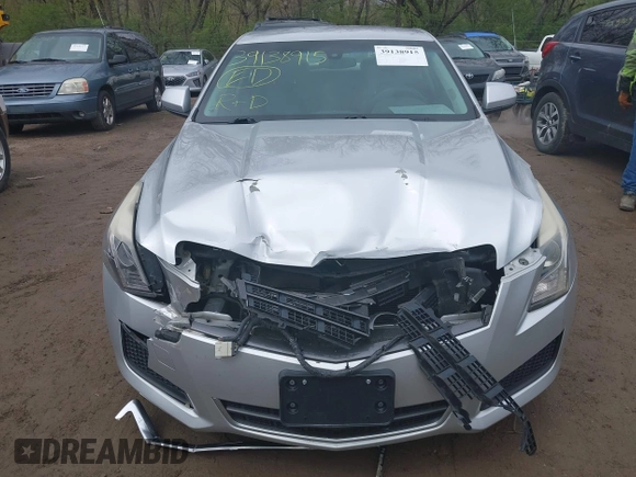 2014 Cadillac ATS Standard RWD z VIN 1G6AA5RA1E0177452, wystawiony jako IAAI lot #39138915 z przebiegiem 134 473 mil mil oraz . Historia ofert i sprzedaży dostępna na DreamBid. Obrazek 6.