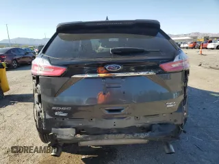 2020 Ford Edge SEL with VIN 2FMPK4J94LBA44997, listed as a Copart auction lot 57360895 with 69,212 mi miles and Salvage title. Bid and sale history available at DreamBid. Image 6.