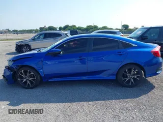 2019 Honda Civic Sport with VIN 19XFC2F83KE014463, listed as a IAAI auction lot 41439533 with 84,379 mi miles and . Bid and sale history available at DreamBid. Image 14.