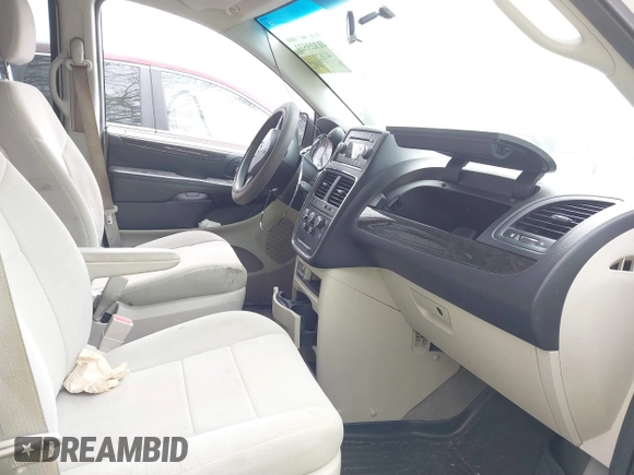 2012 Dodge Grand Caravan SE with VIN 2C4RDGBG9CR232038, listed as a IAAI auction lot 41823766 with 77,468 mi miles and . Bid and sale history available at DreamBid. Image 5.