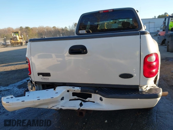 2003 Ford F-150 z VIN 2FTRX08W63CA22223, wystawiony jako IAAI lot #41382377 z przebiegiem 261 841 mil mil oraz . Historia ofert i sprzedaży dostępna na DreamBid. Obrazek 16.