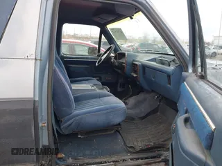 1987 Ford Bronco XL with VIN 1FMEU15N4HLA38776, listed as a IAAI auction lot 41767617 with 52,914 mi miles. Bid and sale history available at carsss.com. Image 5.