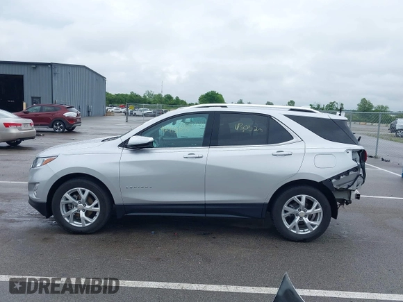 2021 Chevrolet Equinox Premier with VIN 3GNAXNEV4MS153066, listed as a IAAI auction lot 42413071 with 43,052 mi miles and . Bid and sale history available at DreamBid. Image 15.