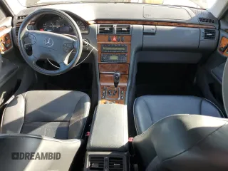 2001 Mercedes-Benz E-Class with VIN WDBJF65J21B365890, listed as a Copart auction lot 50519975 with 110,541 mi miles and Salvage Title. Bid and sale history available at carsss.com. Image 8.