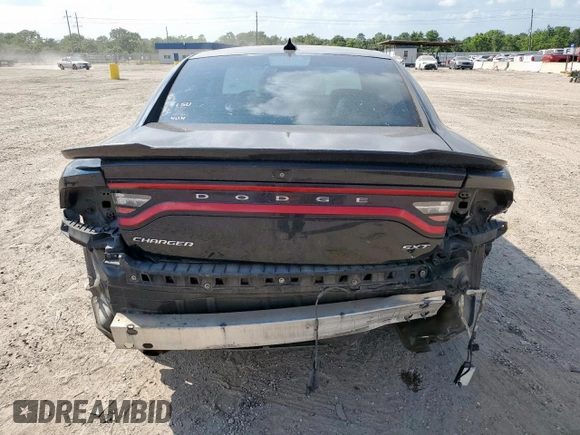 2015 Dodge Charger SXT with VIN 2C3CDXHG7FH721825, listed as a Copart auction lot 58076255 with 193,740 mi miles and Salvage title. Bid and sale history available at DreamBid. Image 6.