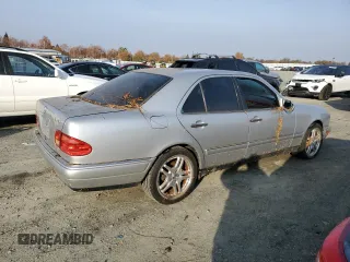 1997 Mercedes-Benz E-Class with VIN WDBJF72F6VA523987, listed as a Copart auction lot 82932444 with 216,038 mi miles and Clean Title. Bid and sale history available at carsss.com. Image 3.