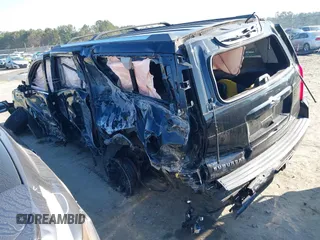2018 Chevrolet Suburban LT with VIN 1GNSKHKCXJR268938, listed as a IAAI auction lot 41672886 with 76,844 mi miles and . Bid and sale history available at DreamBid. Image 3.
