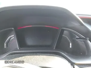 2020 Honda Civic Si z VIN 2HGFC1E57LH700157, wystawiony jako IAAI lot #41935665 z przebiegiem Nie podano mil oraz . Historia ofert i sprzedaży dostępna na DreamBid. Obrazek 7.