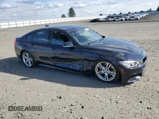 2015 BMW 4 Series 435i xDrive with VIN WBA4B3C51FGV48817, listed as a Copart auction lot 52997265 with 77,812 mi miles and Salvage Title. Bid and sale history available at DreamBid. Image 4.