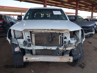 2015 Toyota Tacoma with VIN 3TMMU4FN0FM084956, listed as a IAAI auction lot 42184249 with 116,576 mi miles and . Bid and sale history available at DreamBid. Image 13.
