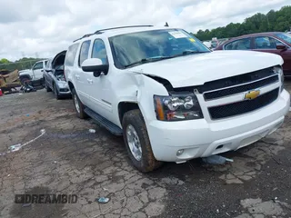 2014 Chevrolet Suburban LT with VIN 1GNSCJE07ER211222, listed as a IAAI auction lot 42428084 with 214,712 mi miles and . Bid and sale history available at DreamBid. Image 1.
