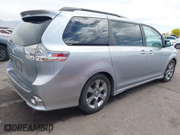 2014 Toyota Sienna SE with VIN 5TDXK3DC4ES491269, listed as a IAAI auction lot 42004485 with 118,516 mi miles and . Bid and sale history available at DreamBid. Image 4.