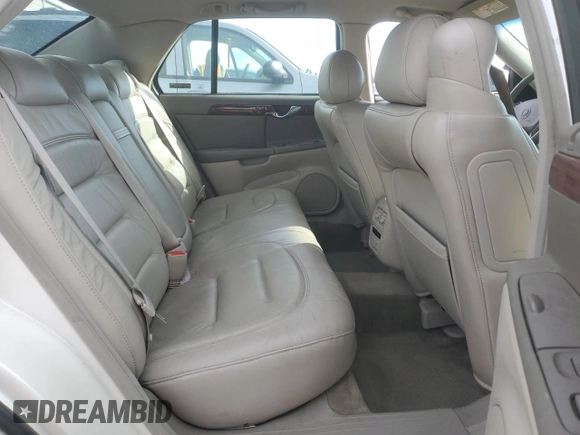 2001 Cadillac DeVille z VIN 1G6KD54YX1U252491, wystawiony jako Copart lot #50325445 z przebiegiem Nie podano mil oraz Szkoda całkowita • Salvage title. Historia ofert i sprzedaży dostępna na DreamBid. Obrazek 10.