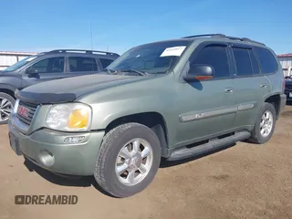 2003 GMC Envoy SLT with VIN 1GKDT13S932373739, listed as a IAAI auction lot 42122017 with 155,963 mi miles. Bid and sale history available at carsss.com. Image 2.